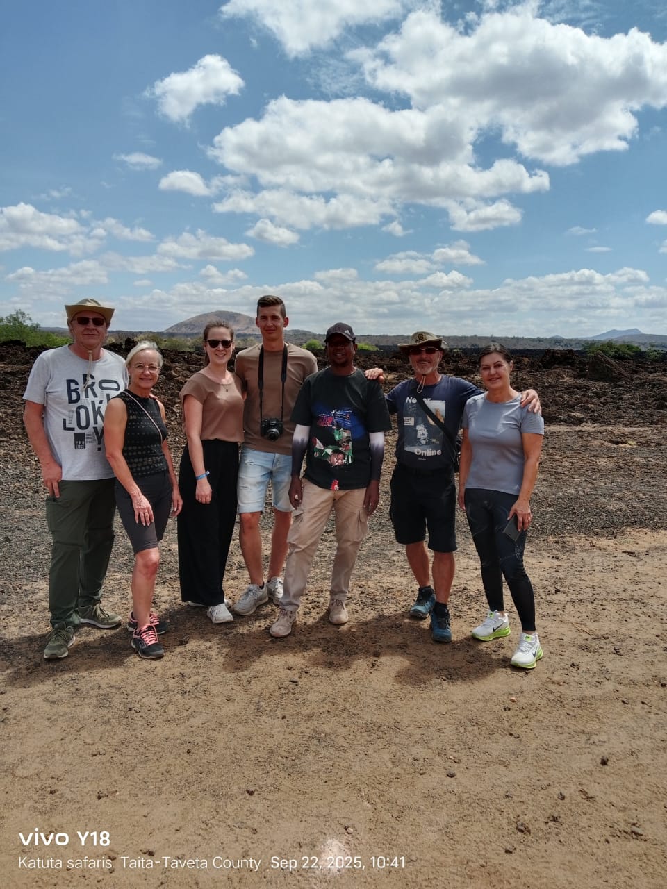 A group of people share a warm hug